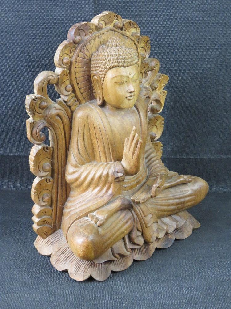 A large carved wooden deity. - Image 3 of 3