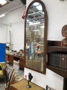A 19th C. MIRROR WALNUT FRAMED WITH A GILT SLIP, THE ROUNDED ARCHED TOP REVERSE CUT WITH THREE