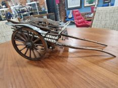 A 1994 CLAUDE BATCHELOR SCALE MODEL TWO WHEELED HORSE DRAWN CART WITH A STEP TO ONE SIDE OF THE