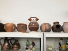 A COLLECTION OF RUSTIC STUDIO POTS BY PENELOPE BENNETT.