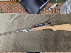 AIRGUN- A HUNGARIAN .22 BREAK BARREL AIR RIFLE SERIAL NUMBER 83509. WITH WEBLEY 4 X 15 SCOPE.