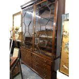 A GEORGIAN AND LATER ASTRAGAL GLAZED MAHOGANY DISPLAY CABINET, THE BASE WITH TWO BANKS OF FOUR