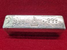 A 26 TROY OUNCE .999 FINE SILVER INGOT 10.5 cm LONG. APPROX 808 gms. (FULLY XRF TESTED)