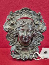 A 19th C. BRONZE BILLIARD BALL RETURN POCKET CAST WITH A HEAD ADORNED WITH GRAPES AND FRAMED BY