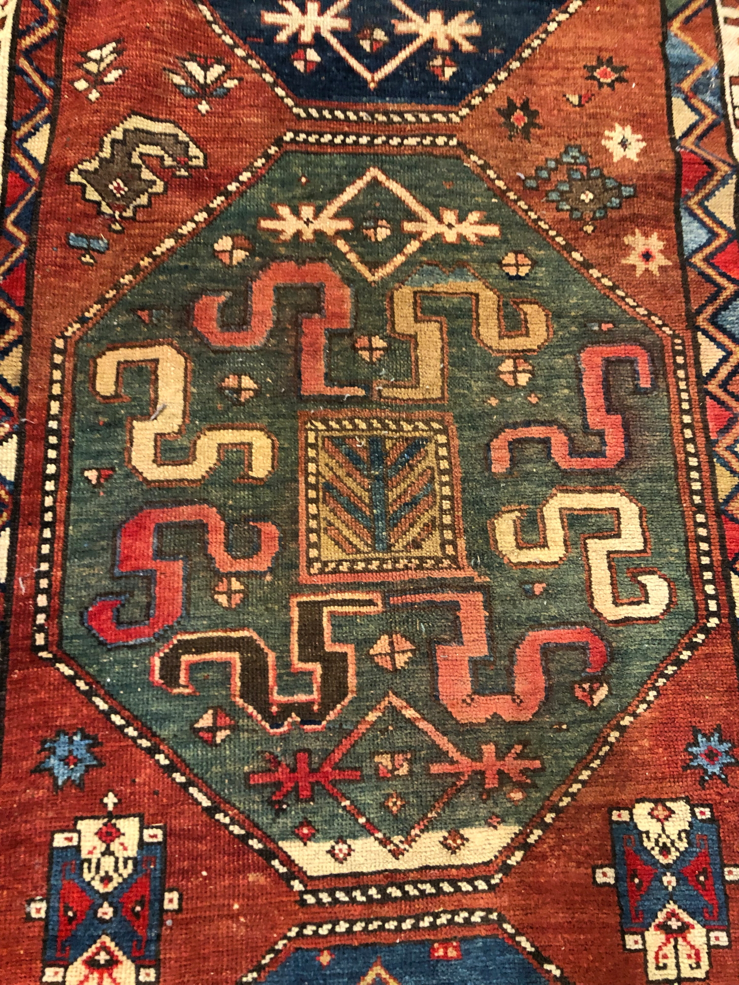 AN ANTIQUE CAUCASIAN KAZAK RUG. 272 x 127cms - Image 3 of 3