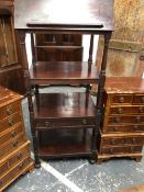 A 19th C. MAHOGANY FOUR TIER WHATNOT, THE TOP RISING ON AN EASEL BACK AS A LECTERN, A DRAWER BELOW