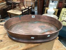 A COPPER OVAL FISH PAN WITH A BRAZED SEAM BELOW ONE OF THE HANDLES. W 60cms.