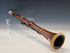 A JAMES WOOD & SONS BOX WOOD AND IVORY CLARINET WITH FOURTEEN STOPS. 67cms