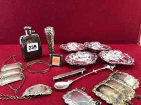 EIGHT SILVER BOTTLE LABELS, FOUR SILVER BONBON DISHES, A SILVER HIP FLASK, 254Gms., A SILVER MOUNTED