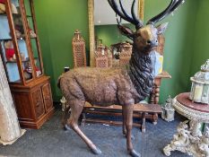 A PAIR BRONZE LIFE SIZED MODELS OF A STAG AND OF A DOE, THE LATTER. H 145cms.
