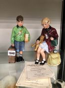 A PAIR OF ROYAL DOULTON FIGURINES "CHILDREN OF THE BLITZ"
