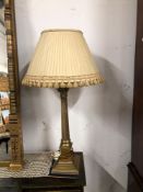 A PAIR OF BRASS CORINTHIAN COLUMN TABLE LAMPS ON STEPPED SQUARE FEET