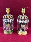 A PAIR OF 19TH CENTURY GILT BRASS MOUNTED CANDLE STICKS WITH GLASS LUSTRE DROPS