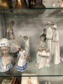 SEVEN LLADRO AND NAO FIGURINES TOGETHER WITH A ROYAL COPENHAGEN GREAT DANE