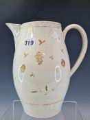 AN 18th C. CREAMWARE BARREL SHAPED JUG WITH GILT DECORATION AND BEARING THE DATE 1791 BELOW THE
