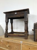AN 18th C. AND LATER OAK JOINT STOOL SUPPORTED ON BALUSTER LEGS