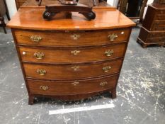 A 19th C. MAHOGANY BOW FRONT CHEST OF FOUR DRAWERS. W 106 x D 58 x H 83cms.
