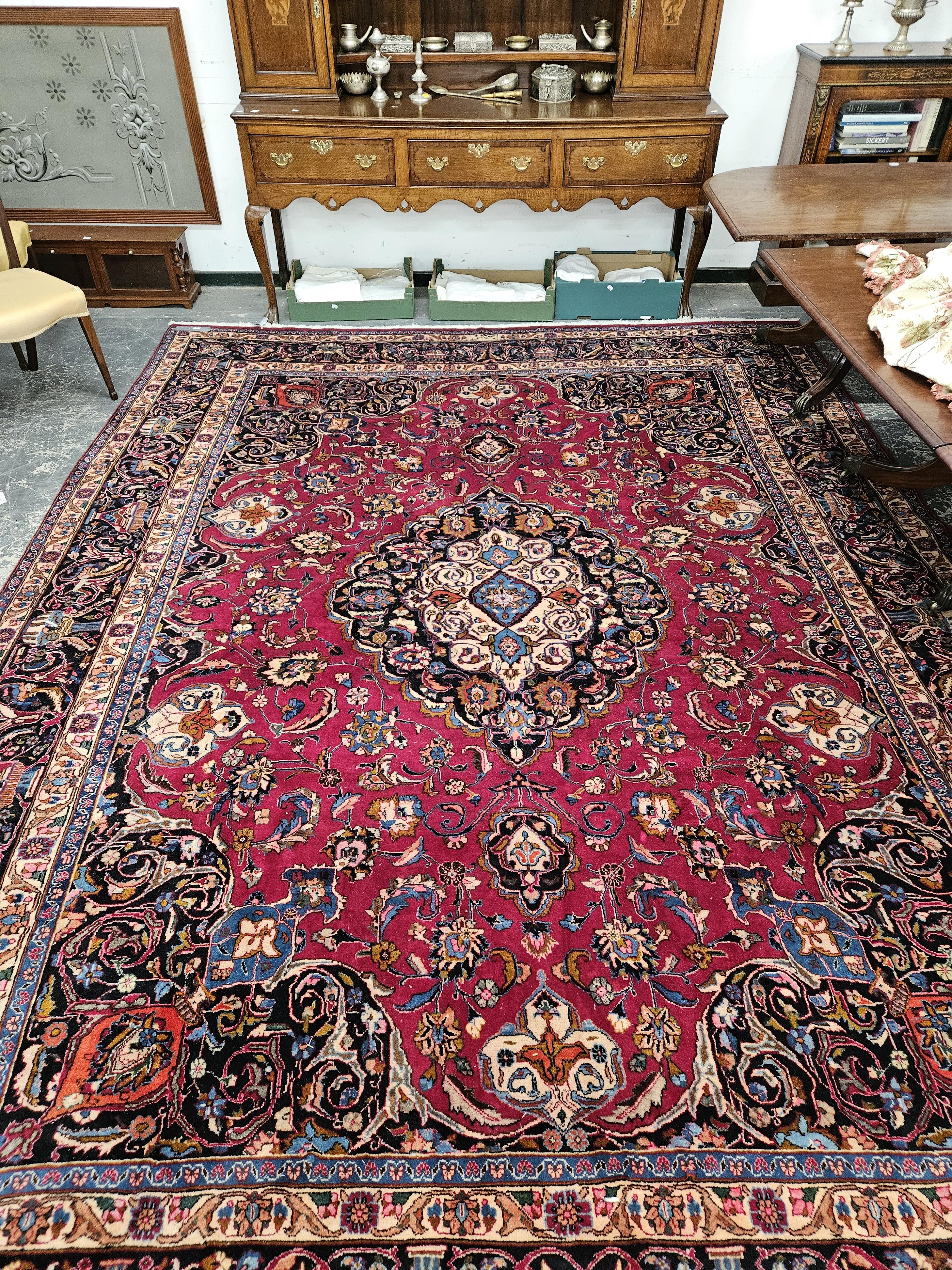 A PERSIAN CARPET OF CLASSIC DESIGN. 296 x 396cms