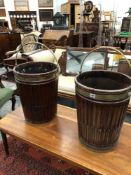 A PAIR OF BRASS BOUND MAHOGANY PEAT BUCKETS, THE CYLINDRICAL STOP FLUTED SIDES TAPERING FROM THE