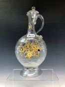 ATTRIBUTED TO LA GRANJA DE SAN IDELFONSO, AN 18th C. CUT GLASS AND FIRE GILT CLARET JUG AND