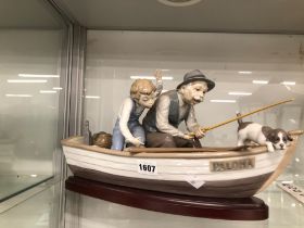 A RARE LLADARO FIGURE GROUP, FISHERMAN IN A BOAT WITH A PUPPY