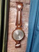 A CAPELLA MAHOGANY BANJO BAROMETER WITH AN ALCOHOL THERMOMETER ABOVE THE SILVERED DIAL, ADJUSTMENT