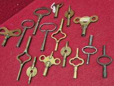 A SMALL COLLECTION OF CARRIAGE AND OTHER CLOCK KEYS