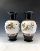 A PAIR OF LATE 19th C. PORCELAIN BALUSTER VASES DECORATED WITH CHARIOTEERS BETWEEN BLACK AND KEY