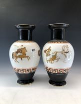 A PAIR OF LATE 19th C. PORCELAIN BALUSTER VASES DECORATED WITH CHARIOTEERS BETWEEN BLACK AND KEY