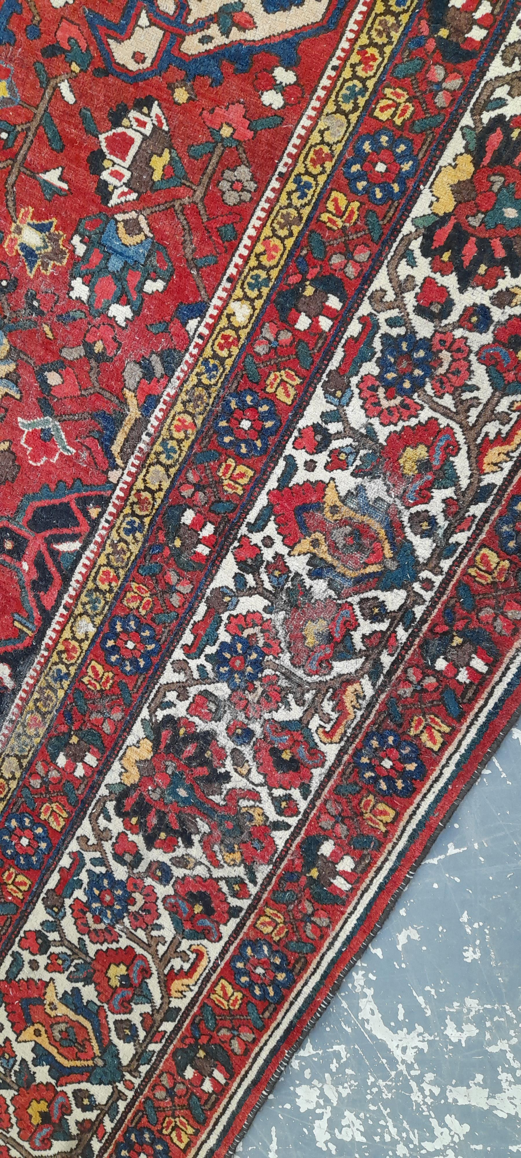 A COUNTRY HOUSE PERSIAN BAHKTIARI CARPET. 560 x 396cms - Image 3 of 8