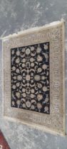 A MACHINE MADE CARPET OF PERSIAN DESIGN. 250 x 194cms