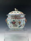 A 19th C. CHINESE FAMILLE ROSE JAR AND COVER PAINTED WITH PRECIOUS OBJECTS ABOUT PAIRS OF IRON RED