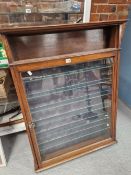 AN ANTIQUE MAHOGANY WALL CABINET BLUE VELVET LINED INTERIOR WITH SHALLOW GLASS SHELVES.