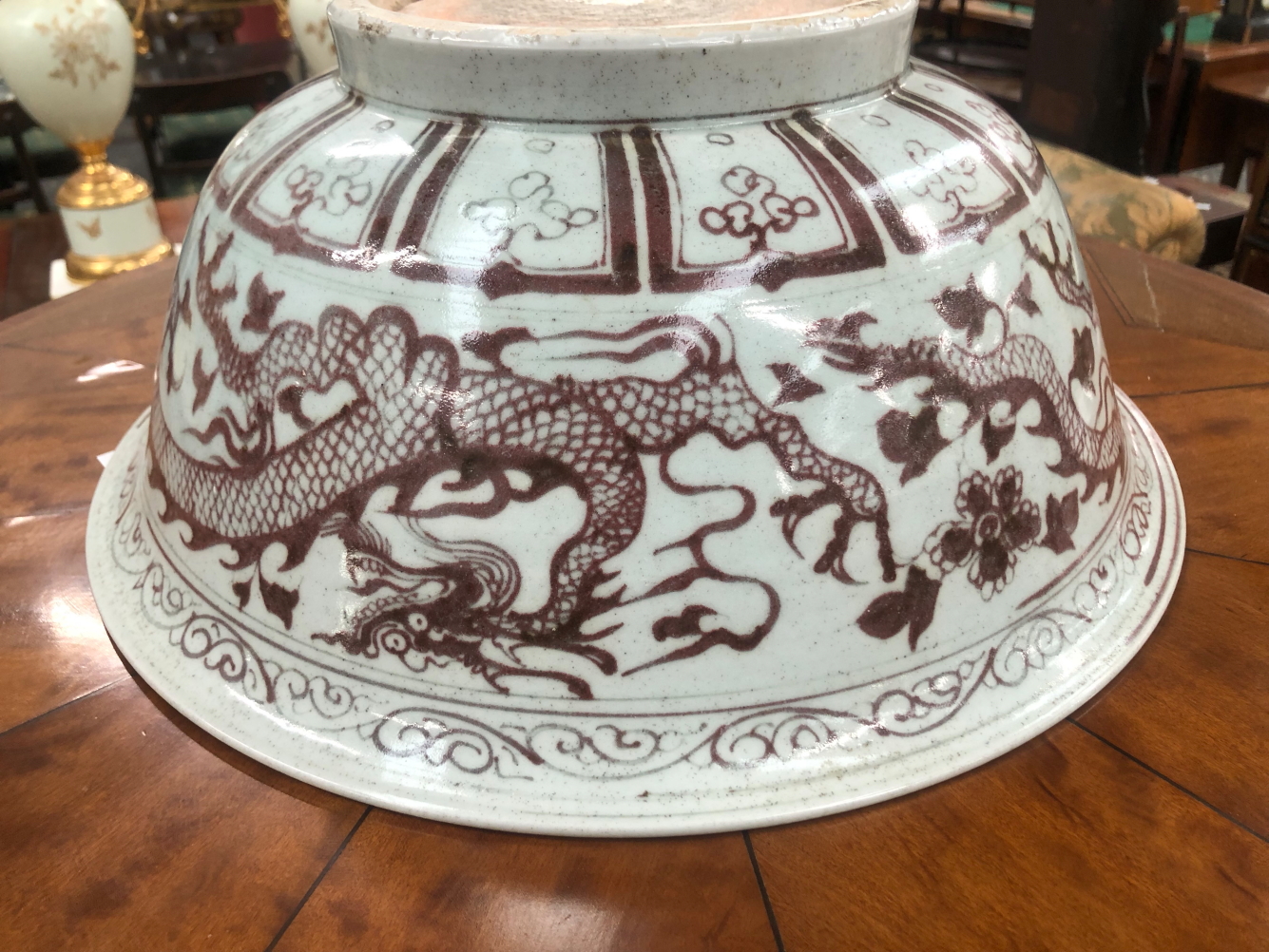 A CHINESE BOWL, THE EXTERIOR DECORATED IN UNDERGLAZE RED WITH DRAGONS. Dia. 39cms. - Image 13 of 15
