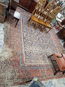 A LARGE FERAGHAN COUNTRY HOUSE CARPET. 395 x 335cms