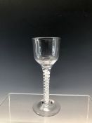 AN 18th C. DOUBLE HELIX OPAQUE TWIST WINE WITH A SLIGHTLY TAPERED CYLINDRICAL BOWL AND CIRCULAR