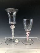 AN 18th C. SODA GLASS RED AND WHITE TWIST WINE. H 12cms. TOGETHER WITH AN OPAQUE TWIST WINE WITH A