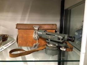 A LEATHER CASED WATTS THEODOLITE
