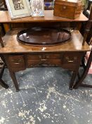 AN 18th C. PADOUK LOWBOY WITH THREE DRAWERS ABOVE A WAVY APRON AND LEGS TAPERING TO SQUARE PAD FEET.