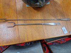 TWO ANTIQUE HAND FORGED IRON TOASTING FORKS, ONE WITH TWO PRONGS. 59cms AND THE OTHER WITH THREE.