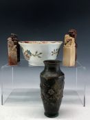 A CHINESE FAMILLE ROSE BOWL, THE EXTERIOR PAINTED WITH TWO SPRAYS OF FLOWERS. Dia. 11.5cms. FOUR