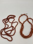 AN ANTIQUE CONTINUOUS ROW OF CORAL BEADS, APPROXIMATE DIAMETER 3.6mm, LENGTH 128cms, TOGETHER WITH A