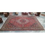 A COUNTRY HOUSE PERSIAN BAHKTIARI CARPET. 560 x 396cms