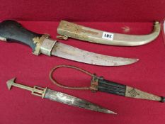 TWO MIDDLE EASTERN (PROBABLY SUDAN) BELT KNIVES ONE WITH CURVED BLADE IN NICKLE AND BRASS