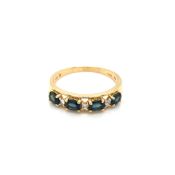 A HALLMARKED 9ct GOLD SAPPHIRE AND GEMSET HALF ETERNITY RING. FINGER SIZE N 1/2. WEIGHT 1.98grms.