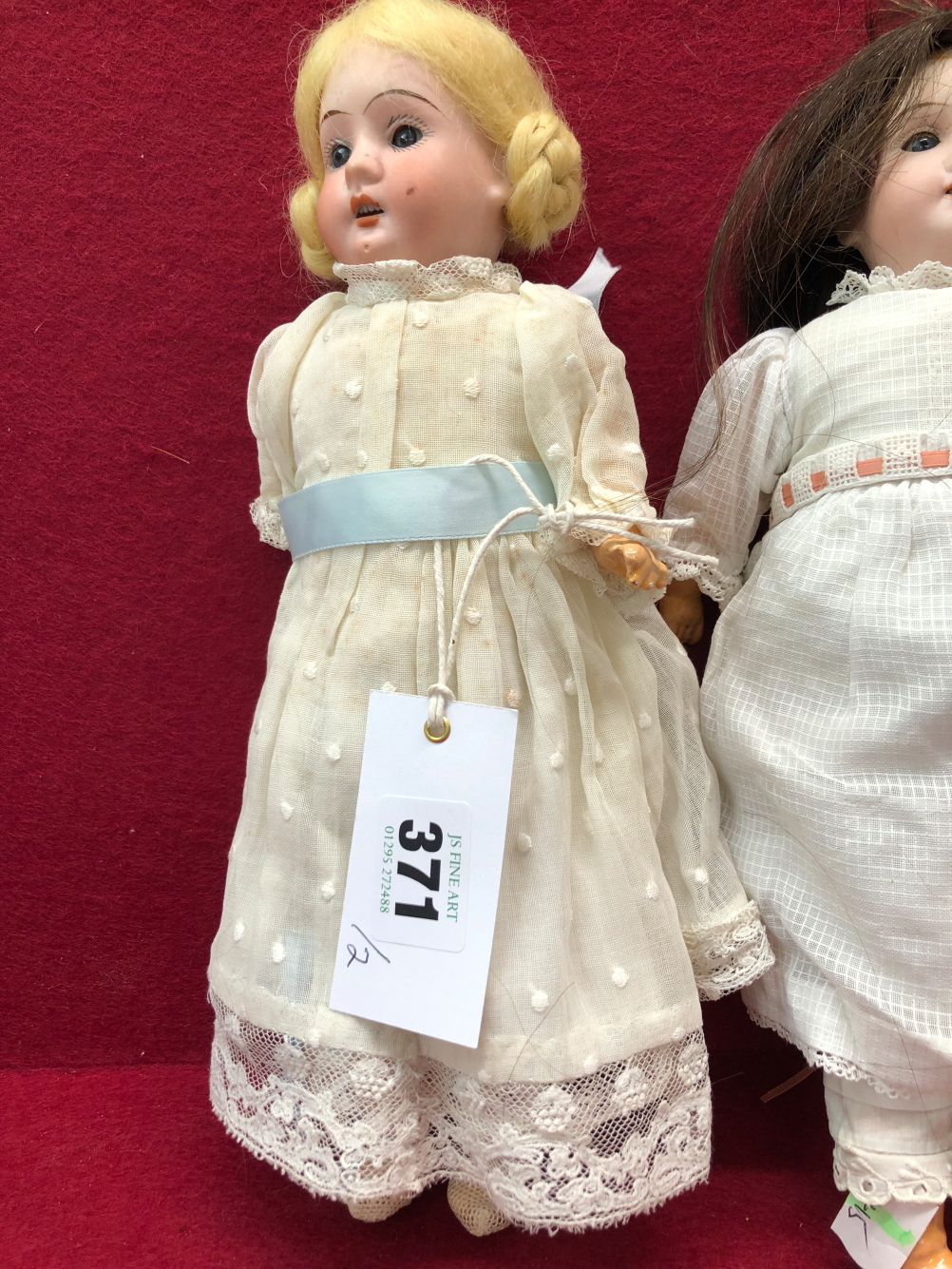 A GERMAN BISQUE HEADED DOLL WITH FIXED EYES AND OPEN MOUTH. H 29cms. TOGETHER WITH ANOTHER BISQUE - Image 2 of 4