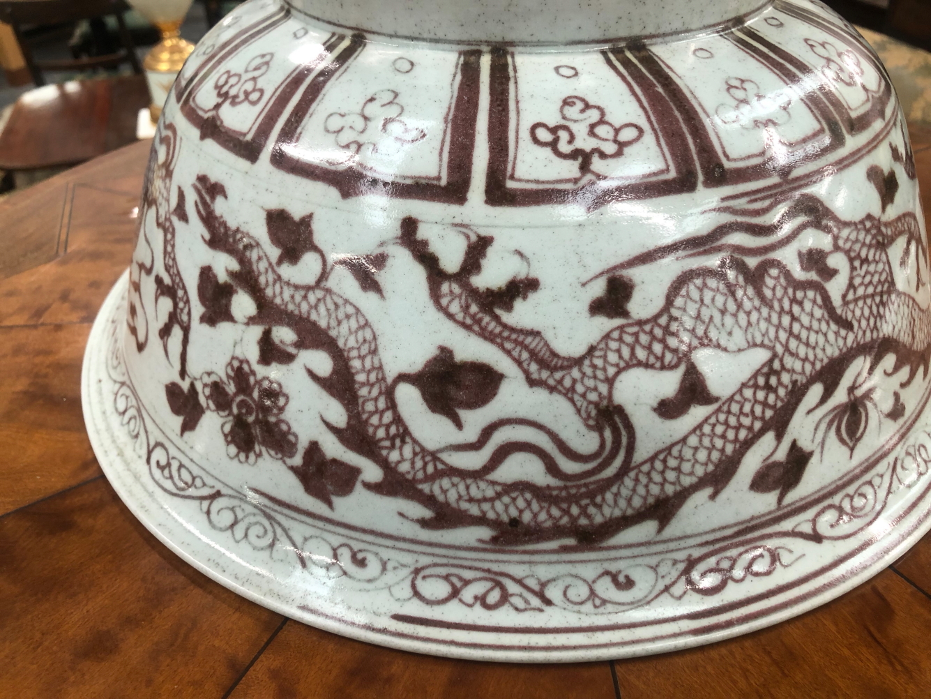 A CHINESE BOWL, THE EXTERIOR DECORATED IN UNDERGLAZE RED WITH DRAGONS. Dia. 39cms. - Image 12 of 15