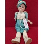 AN SFBJ 60 BISQUE HEADED DOLL WITH SLEEPING EYES AND OPEN MOUTH. H 32cms.