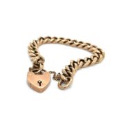 A 9ct HALLMARKED ROSE GOLD CHARM BRACELET, COMPLETE WITH SAFETY CHAIN AND PADLOCK. WEIGHT 18.