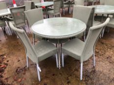 A CIRCULAR LLOYD LOOM PATIO TABLE AND 4 MATCHING CHAIRS.